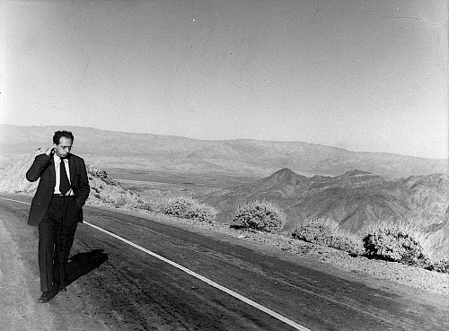 Aaron Copland walking down a Mexican road. Library of Congress, Music Division.